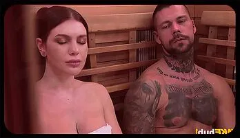 Busty MILF Tempted in Steamy Sauna Seduction