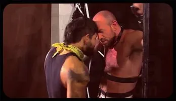 Muscle slave submits to dark basement electro torture with big cock