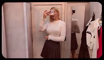 Curvy Blonde Teases in Sheer Fabric – No Panties in Fitting Room