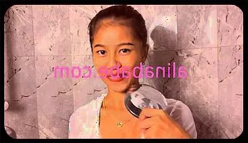 Seductive Asian Teen Teases in the Bathroom