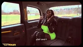 Ebony Mystique’s Wild Ride: Busty Black Shemale Takes Thick Cock in Fake Taxi