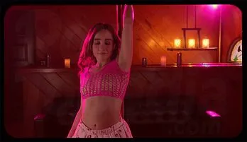 Seductive Encounter: Big-Breasted Beauty Ignites Passion in Strip Club