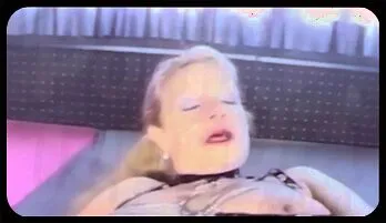 Bea Dumas: Seductive French Domina Teases in Shiny Latex